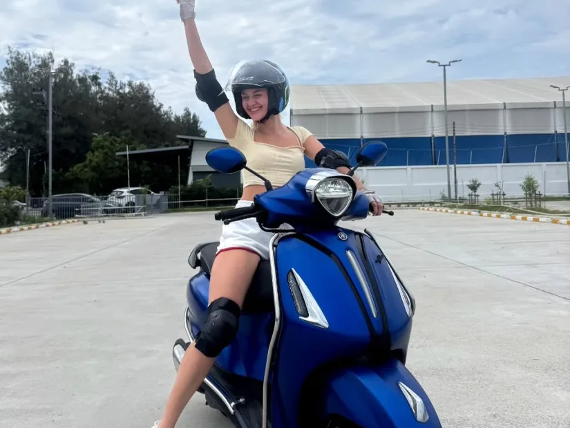 Student after the city stage of the scooter course in Phuket